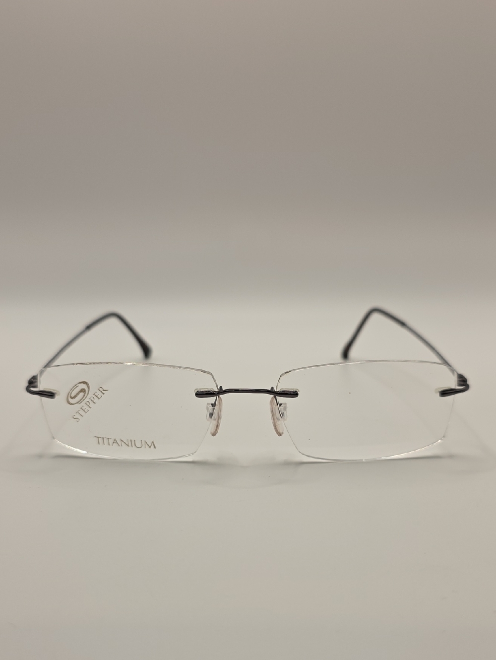 Stepper Non-Prescription Rimless Titanium Glasses in Gunmetal